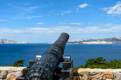 Medieval canon pointed toward sea. mediterranean, war, defence, history.