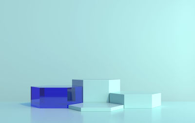 Stack of blue table against white background