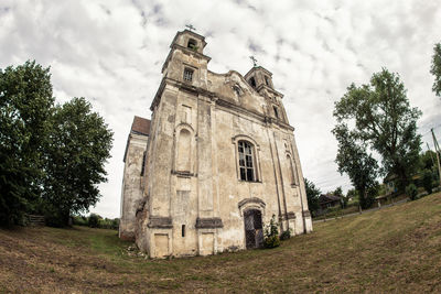 Low angle view of historical building against sky