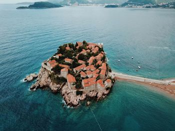 High angle view of rocks by sea