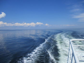 Scenic view of sea against blue sky