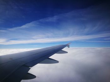 Cropped image of airplane wing