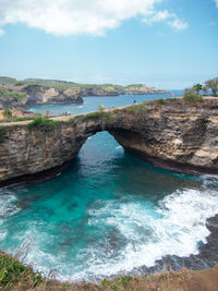 High angle view of sea shore against sky