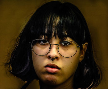 Close-up portrait of young woman