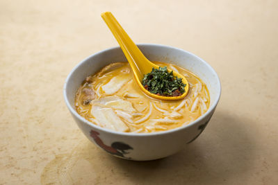 High angle view of laksa in bowl on table