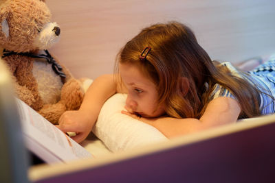 Portrait of girl with toy