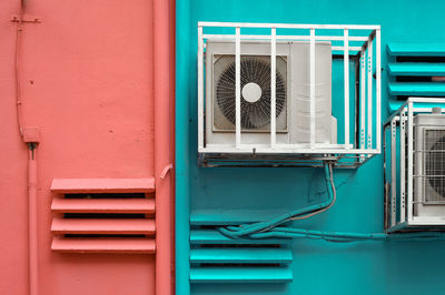 Low angle view of air conditioning unit on  building