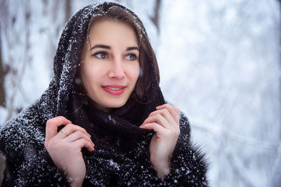 Portrait of woman in snow