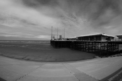 Pier over sea against sky