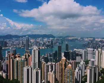 Aerial view of city buildings against sky