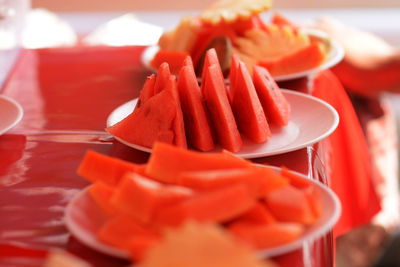 Close-up of watermelons in plate on table