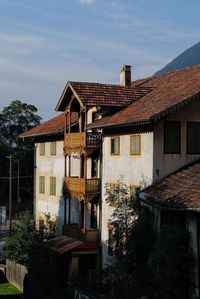 Houses against sky in city