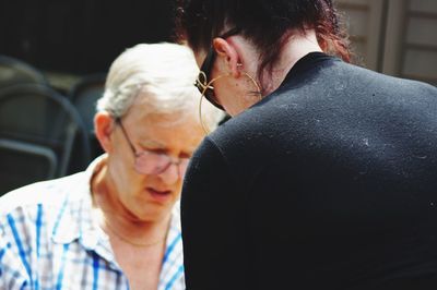 Portrait of couple kissing outdoors