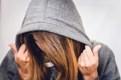 Portrait of woman wearing hoodie 