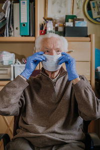 Portrait of man wearing mask