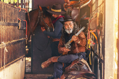 Low section of man standing in store