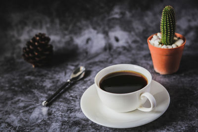 Cup of coffee on table