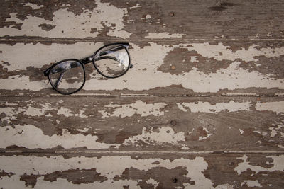 Overhead view of glasses on wooden floor