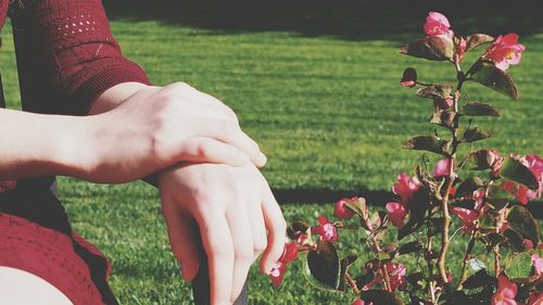 Close-up of womans's hands outdoors