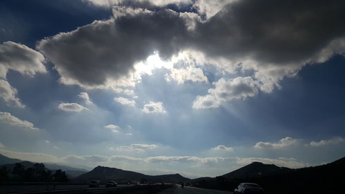 Scenic view of cloudscape over mountains