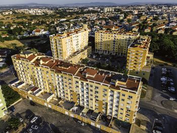 High angle view of street amidst buildings in city