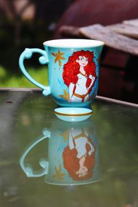 Close-up of cup of coffee served on table