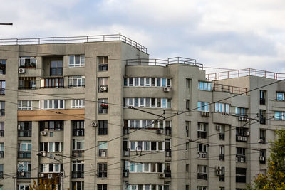 Buildings in city against sky