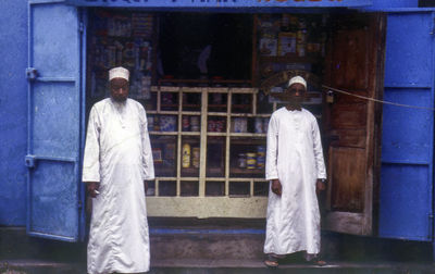 Full length of man standing on cross