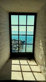 Sea seen through window