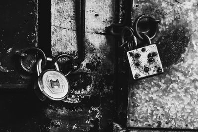 Close-up of padlocks on window