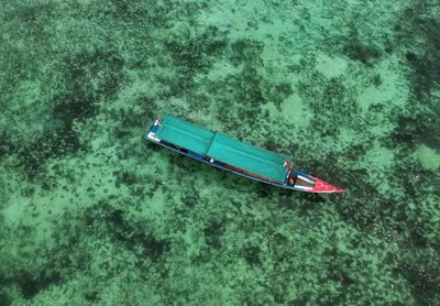 High angle view of boat floating on sea