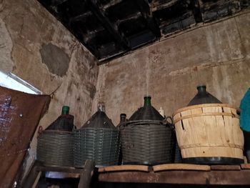 Stack of bottles in building