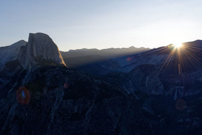 Scenic view of mountains against sky during sunset