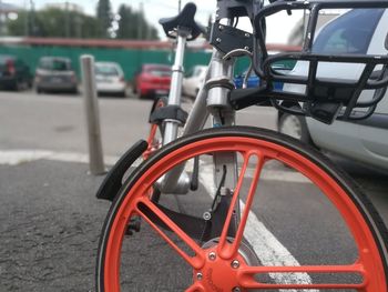 Close-up of bicycle parked on road