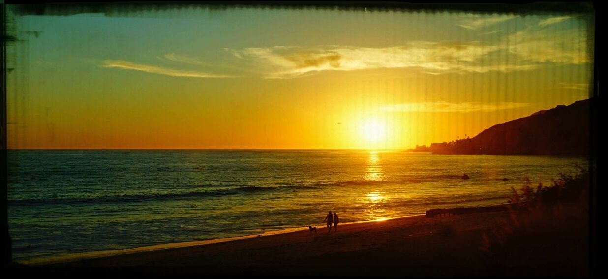 sunset, sea, water, horizon over water, scenics, sun, tranquil scene, beauty in nature, tranquility, sky, beach, silhouette, orange color, idyllic, transfer print, shore, nature, sunlight, reflection, auto post production filter