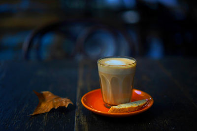 Close-up of coffee cup on table