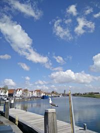 View of harbor against blue sky