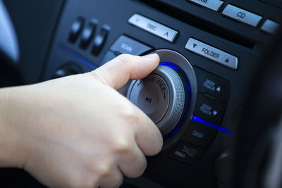 Hand holding a radio car