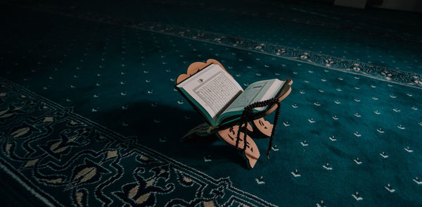 High angle view of open book on table