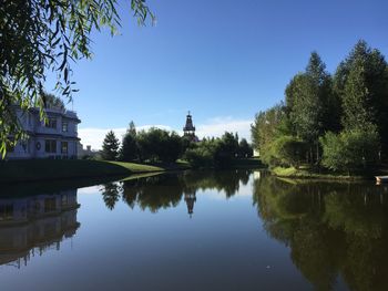 Reflection of trees in calm lake