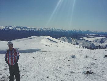 Scenic view of snow covered mountains