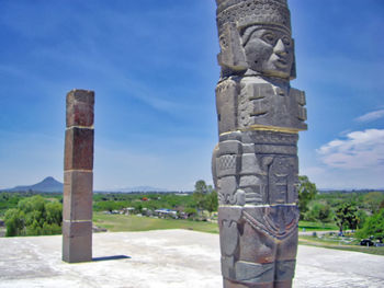 View of sculpture against blue sky