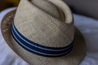 High angle view of hat on bed