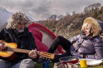 Woman playing guitar