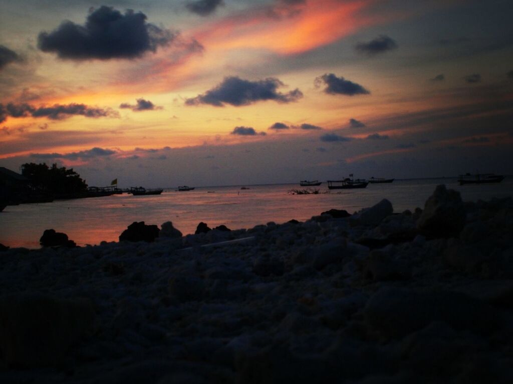 sunset, sea, water, scenics, tranquil scene, tranquility, sky, beauty in nature, horizon over water, beach, silhouette, nature, rock - object, idyllic, shore, orange color, cloud - sky, dusk, outdoors, calm