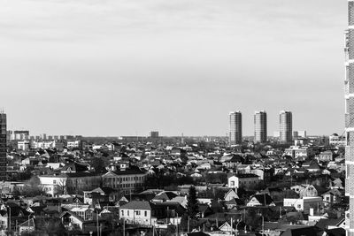 High angle view of buildings in city against sky