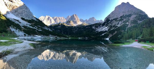 Scenic view of snowcapped mountains against sky