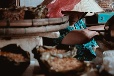 Close-up of women sitting on floor