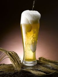Close-up of beer glass on table