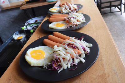 High angle view of breakfast served on table